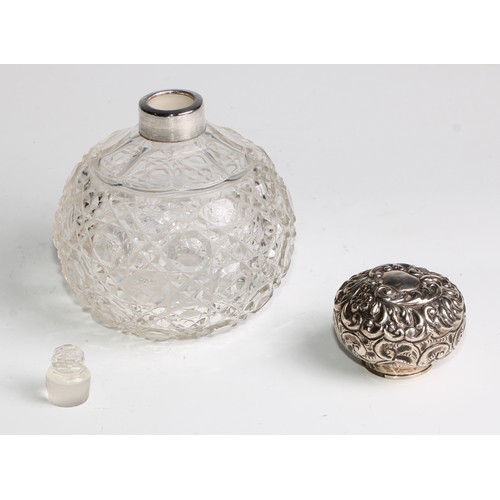 996 - A large Victorian silver mounted glass inkwell, the hinged domed cover chased with flowers and scrol... 