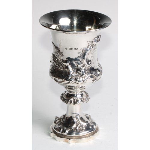 1152 - An early Victorian silver campana goblet, of military interest, chased with a hare coursing scene, f... 