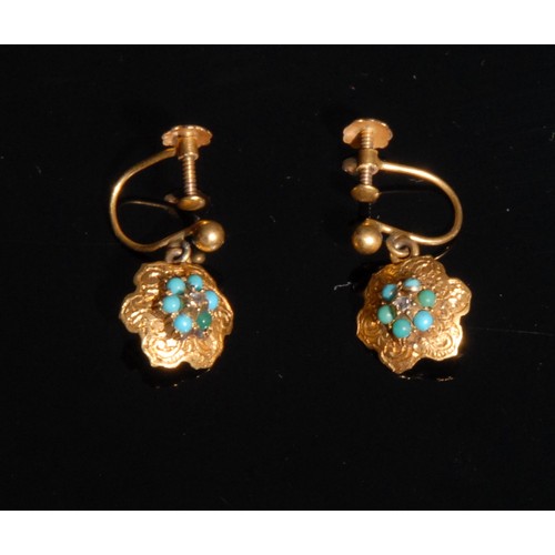 1454 - A Victorian 9ct gold muff or guard chain, divided by textured roundels each set with four turquoise ... 