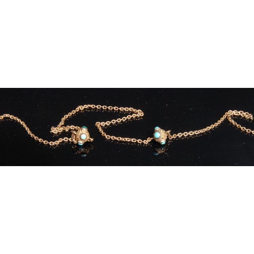 1454 - A Victorian 9ct gold muff or guard chain, divided by textured roundels each set with four turquoise ... 