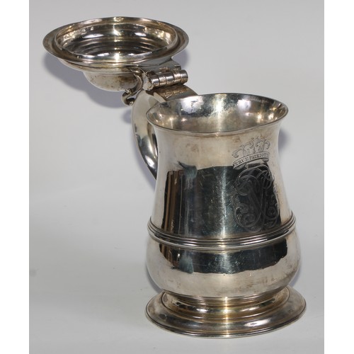 898 - A George II silver bell shaped tankard, hinged domed cover with scroll thumbpiece, S-scroll handle w... 