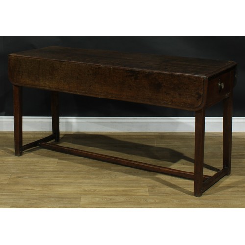 2043 - A George III vernacular oak servants' quarters Pembroke table, rounded rectangular top with fall lea... 