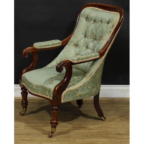 2619 - A William IV rosewood library chair, stuffed-over upholstery, scroll handrests, stylised lotus carve... 