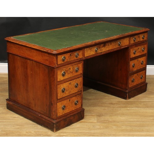 2281 - A Victorian walnut and mahogany twin pedestal desk, rounded rectangular top above three frieze drawe... 