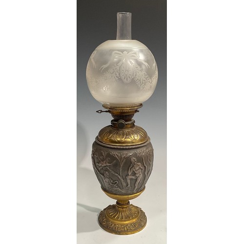 2016 - A 19th century silvered and gilt-metal ovoid table oil lamp, in the Grand Tour taste, chased after t... 