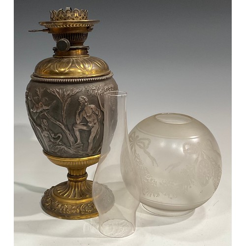 2016 - A 19th century silvered and gilt-metal ovoid table oil lamp, in the Grand Tour taste, chased after t... 