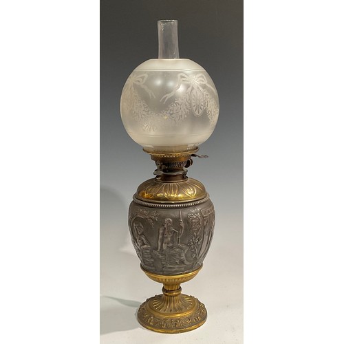 2016 - A 19th century silvered and gilt-metal ovoid table oil lamp, in the Grand Tour taste, chased after t... 