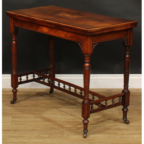 2061 - A late Victorian rosewood and marquetry card table, in the manner of Gillows of Lancaster and London... 