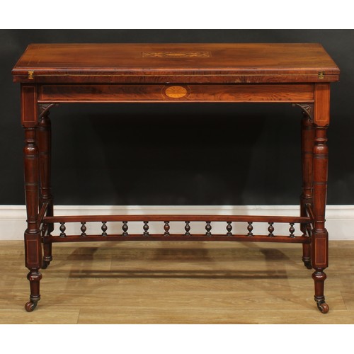 2061 - A late Victorian rosewood and marquetry card table, in the manner of Gillows of Lancaster and London... 