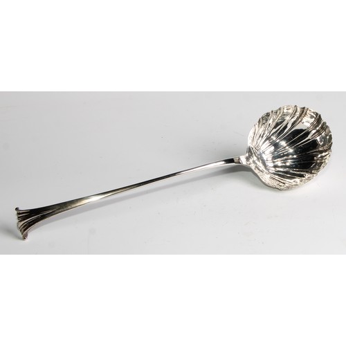 930 - A George III silver Onslow pattern soup ladle, shell bowl, 35cm long,  London 1762