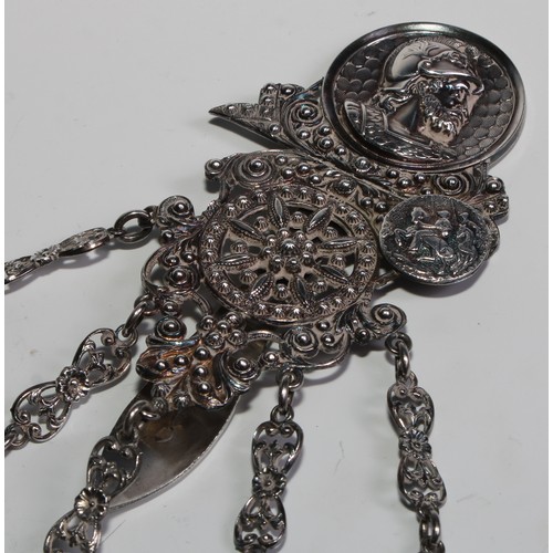 1229 - Sewing - a Victorian silver chatelaine, the clip embossed with a profile portrait after the antique,... 