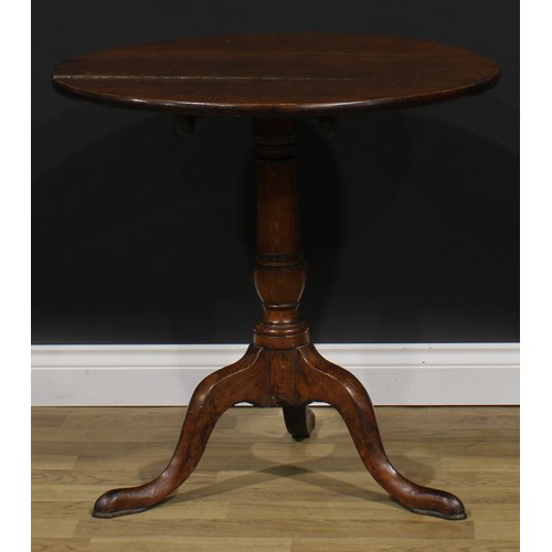 2120 - A George III oak tripod occasional table, circular tilting top, cannon barrel column, cabriole legs,... 