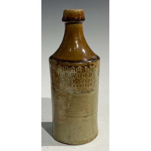 1807 - A mid 19th century two-tone slip glazed slab sealed stoneware porter, applied shaped rectangular sla... 