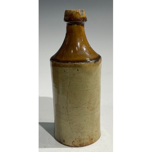 1807 - A mid 19th century two-tone slip glazed slab sealed stoneware porter, applied shaped rectangular sla... 