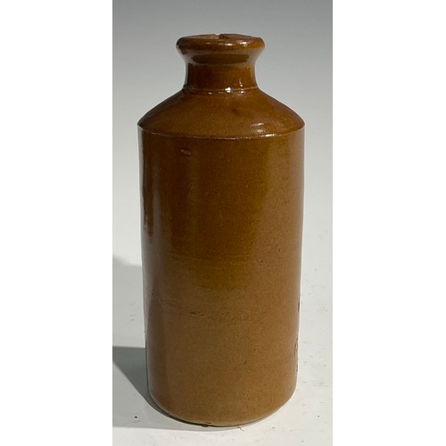 1807 - A mid 19th century two-tone slip glazed slab sealed stoneware porter, applied shaped rectangular sla... 