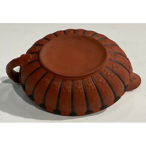 342 - An unusual 19th century Wedgwood Etruscan sauce boat, red moulded body, black sprigged details, impr... 