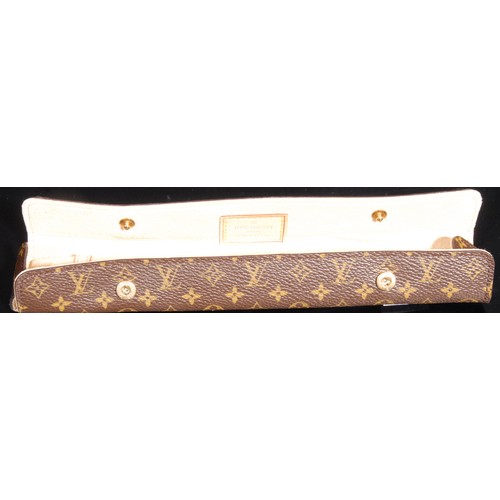 1527 - Designer Jewellery - an 18ct white gold Louis Vuitton monogram bracelet, 22cm long, cased and boxed