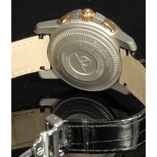 1283 - A Baume & Mercier 18ct gold and titanium Capeland S XL chronograph wristwatch, No 3574469, stainless... 