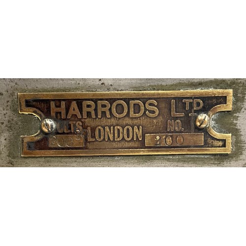 2645 - An Art Deco style brass plate warmer, retailed by Harrods, ebonised handles, 53cm wide