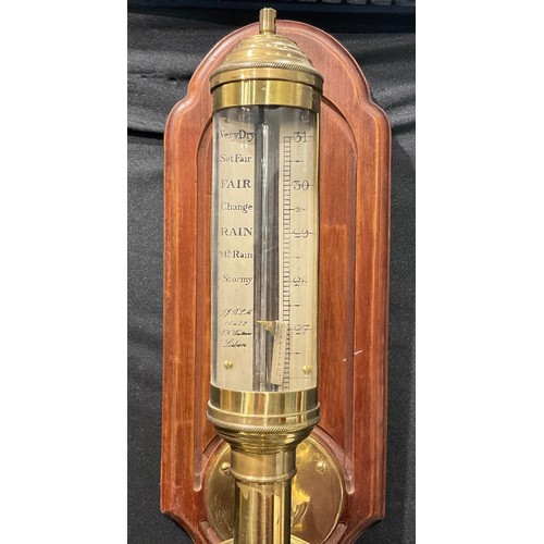 2079 - A Portuguese brass marine stick barometer, the silvered register calibrated in barometric inches wit... 