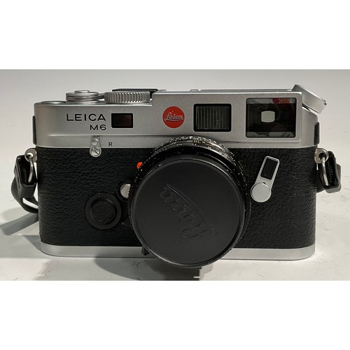 1721 - Photography - a Leica M6 TTL silver body camera; a Leica 35mm f2 Summicron-M ASPH lens; a Leica 90mm... 