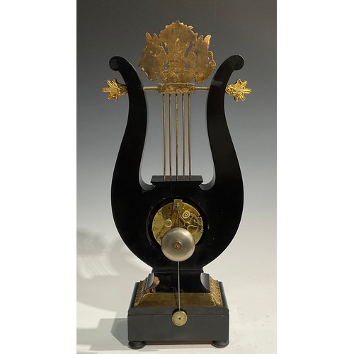 2404 - A Louis XVI Revival gilt metal mounted ebonised lyre-shaped table clock, 8.5cm silvered dial inscrib... 