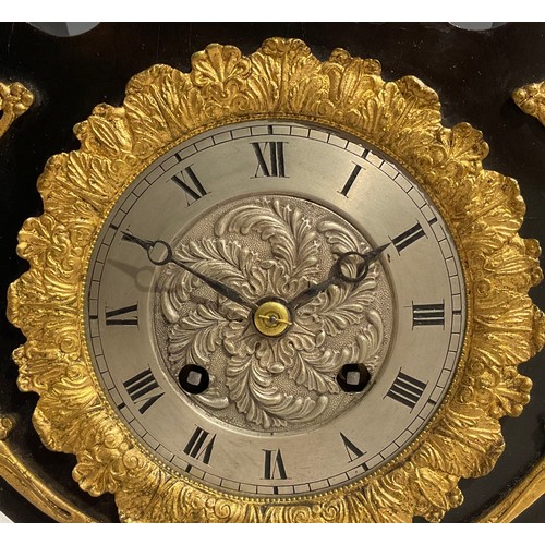 2404 - A Louis XVI Revival gilt metal mounted ebonised lyre-shaped table clock, 8.5cm silvered dial inscrib... 