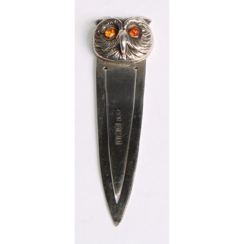 1244 - Signopaginophilia - a Victorian silver novelty bookmark, the terminal as an owl, glass eyes, 9cm lon... 