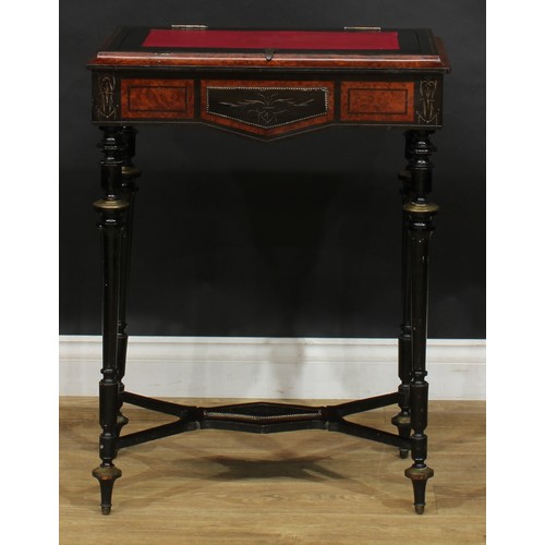 1578 - A 19th century brass mounted amboyna and ebonised table, shaped apron, turned and fluted supports, s... 