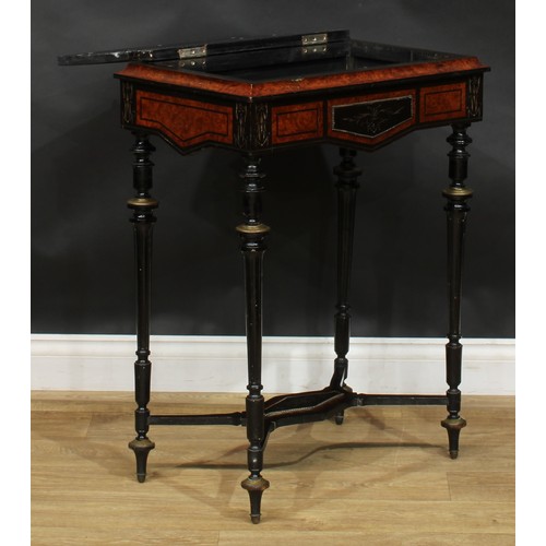 1578 - A 19th century brass mounted amboyna and ebonised table, shaped apron, turned and fluted supports, s... 