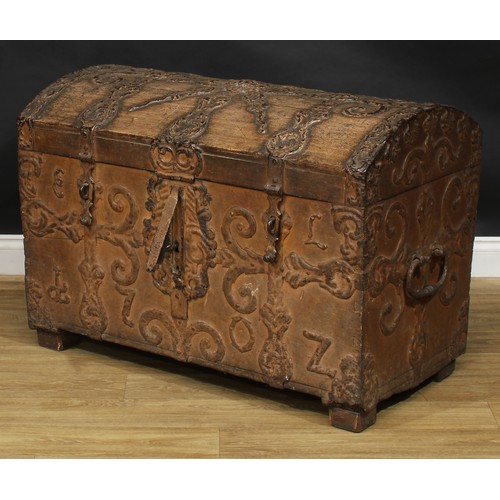 2009 - An early 18th century Spanish metal bound chest or trunk, hinged dome top, carry handles to sides, t... 