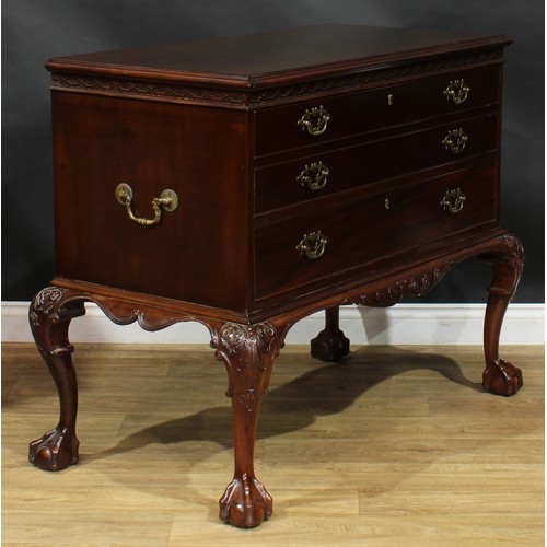 2105 - A George III mahogany secretaire chest on stand, in the manner of William Vile, later retailed by Mu... 