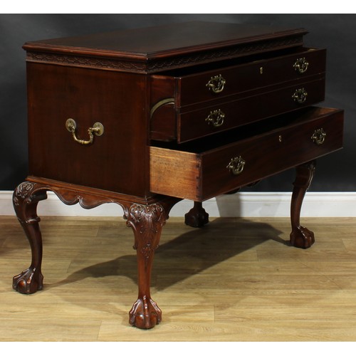 2105 - A George III mahogany secretaire chest on stand, in the manner of William Vile, later retailed by Mu... 