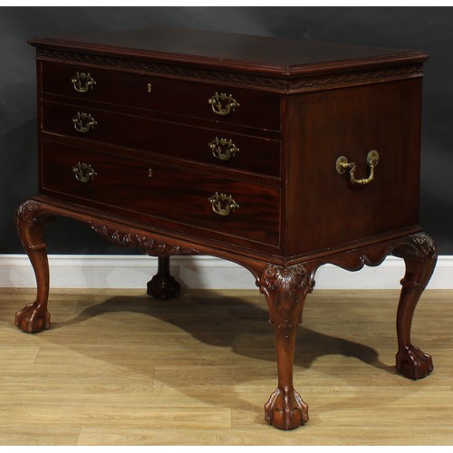 2105 - A George III mahogany secretaire chest on stand, in the manner of William Vile, later retailed by Mu... 