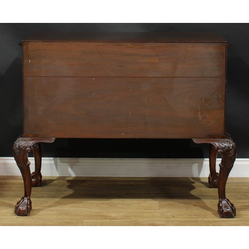 2105 - A George III mahogany secretaire chest on stand, in the manner of William Vile, later retailed by Mu... 