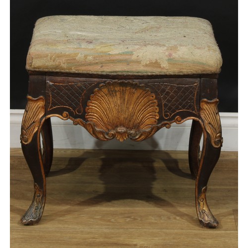 1971 - A pair of George II Revival parcel-gilt stools, stuffed-over upholstery, the frieze carved with a sh... 