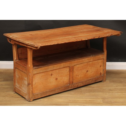 2674 - An early 20th century pine monk’s bench, hinged seat, 72.5cm opening to 127cm high, 136.5cm wide, 73... 