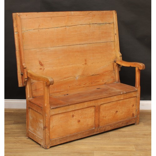 2674 - An early 20th century pine monk’s bench, hinged seat, 72.5cm opening to 127cm high, 136.5cm wide, 73... 