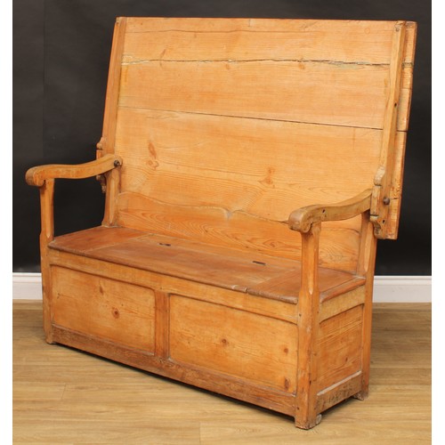 2674 - An early 20th century pine monk’s bench, hinged seat, 72.5cm opening to 127cm high, 136.5cm wide, 73... 