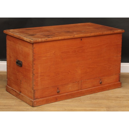 1960 - A late Victorian pine mule chest, hinged top enclosing a till above a pair of short drawers, carry h... 