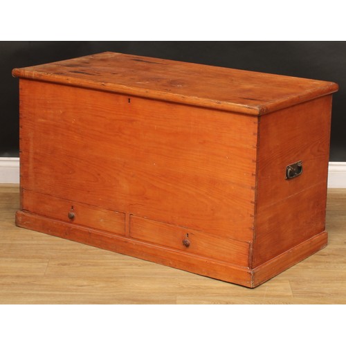 1960 - A late Victorian pine mule chest, hinged top enclosing a till above a pair of short drawers, carry h... 