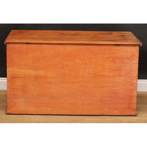 1960 - A late Victorian pine mule chest, hinged top enclosing a till above a pair of short drawers, carry h... 