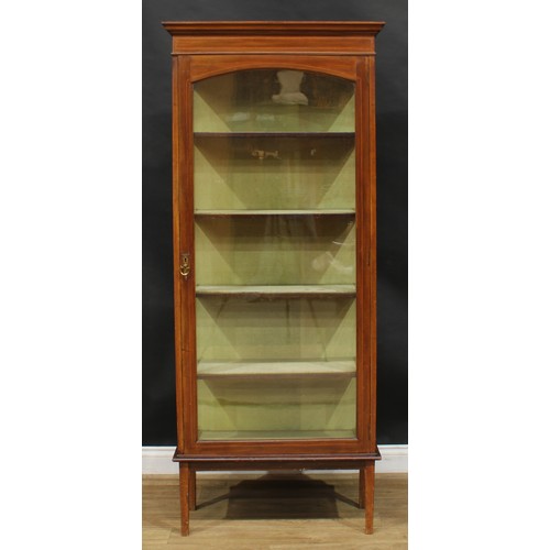 2229 - An Edwardian mahogany display cabinet, moulded cornice above a glazed door enclosing four shelves, t... 