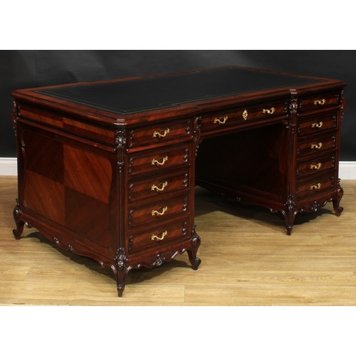 2057 - A late 19th century French rosewood and kingwood twin pedestal desk, inverted break-centre top with ... 