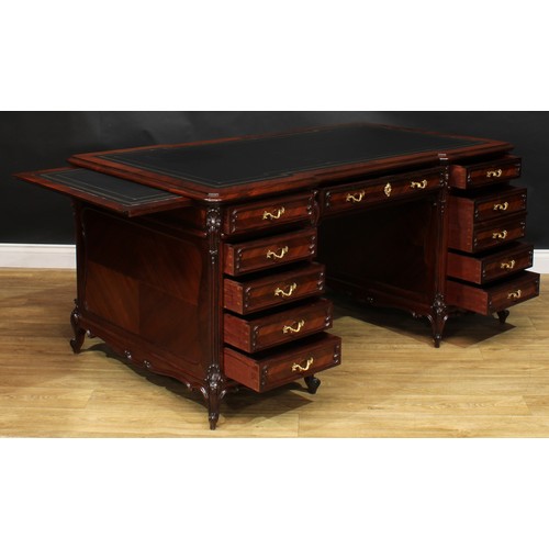 2057 - A late 19th century French rosewood and kingwood twin pedestal desk, inverted break-centre top with ... 