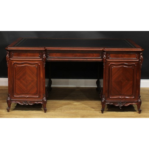 2057 - A late 19th century French rosewood and kingwood twin pedestal desk, inverted break-centre top with ... 