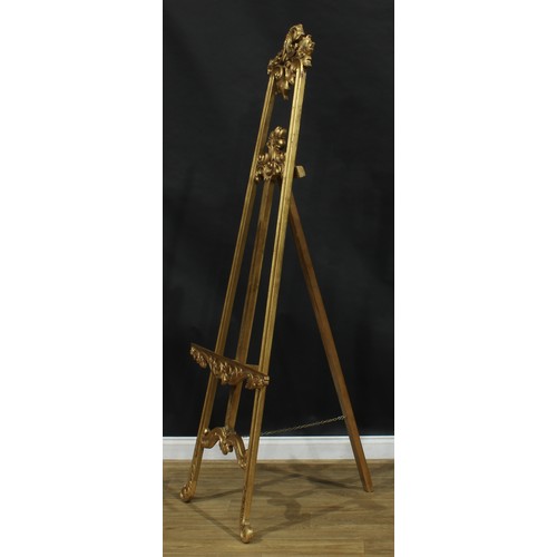 1900 - Interior Design - a giltwood floor-standing painting easel, 211.5cm high, 80cm wide