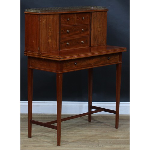 1980 - A pair of Sheraton Revival mahogany and marquetry bonheurs du jour, each with a shallow brass three-... 