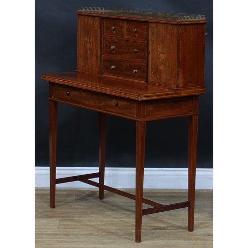 1980 - A pair of Sheraton Revival mahogany and marquetry bonheurs du jour, each with a shallow brass three-... 