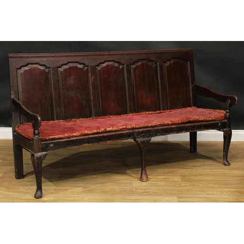 2007 - An 18th century oak settle, rectangular back with five arched raised and fielded panels, shaped arms... 